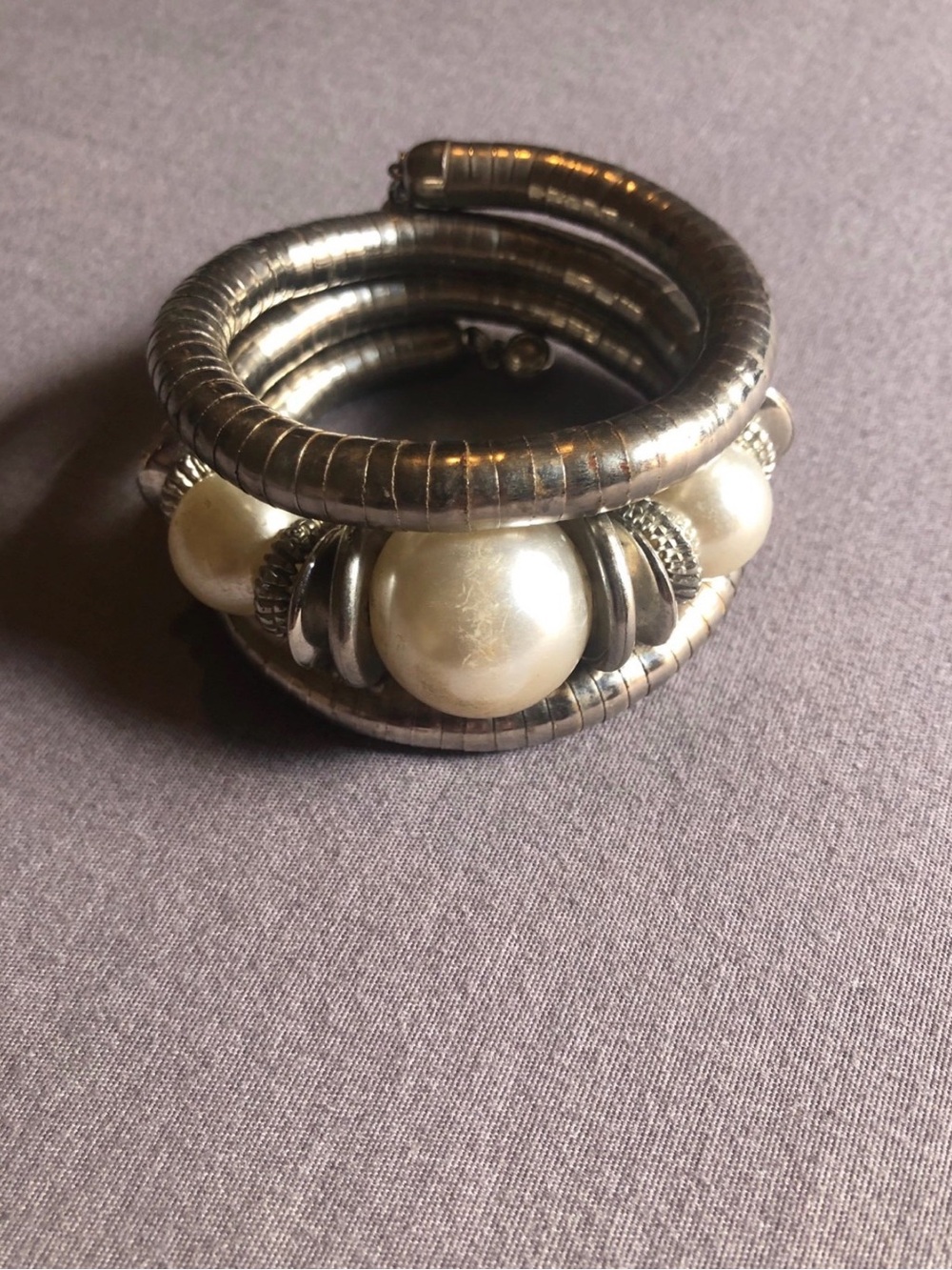 Elegant Silver-Tone Coil Bracelet with Ivory Pearl Accents